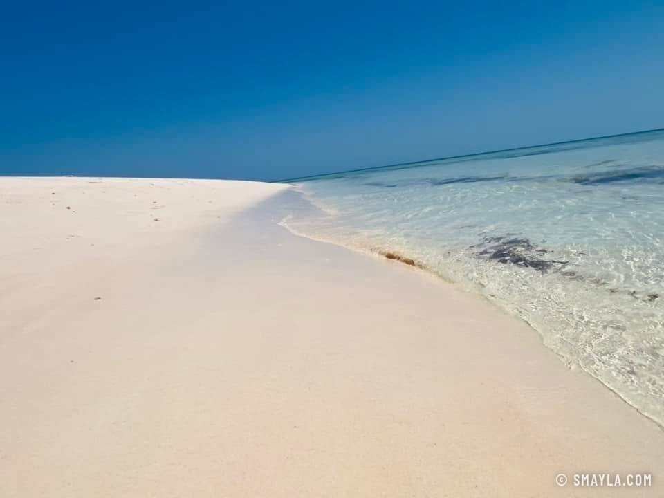 Sable blanc et eau turquoise