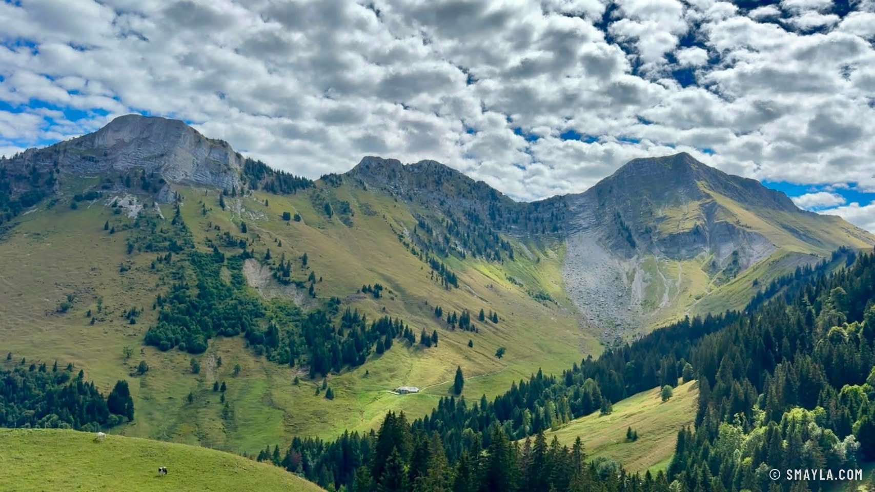 Peaks under a dappled sky