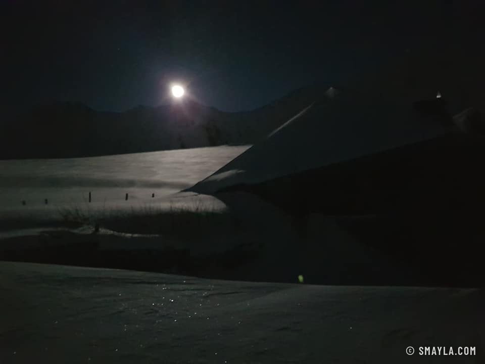 Full moon over the snow